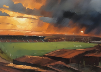 Painterly watercolour view across a small Northern English football ground at golden hour, dramatic sunset sky, no people