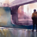 A lone hooded supporter pauses on a railway bridge at dusk, looking through the bridge arches to the lit silhouette of Big Ben and Westminster in the distance — painterly watercolour